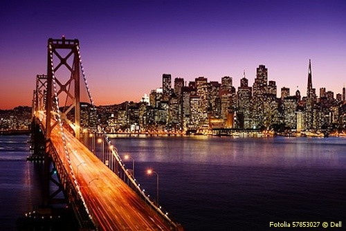 San Francisco skyline and Bay Bridge at sunset, California